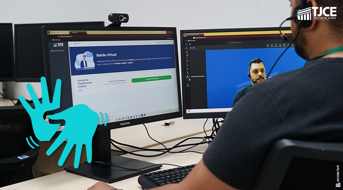 Imagem em que se vê as costas de um homem, olhando para a tela de um computador e, ao lado, dele, o desenho de duas mãos representando o simbolo de Libas